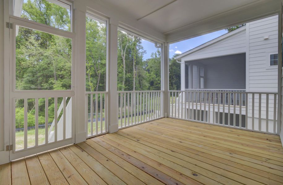 Exterior details and patio area of a home in , Johns Island (Image 29).