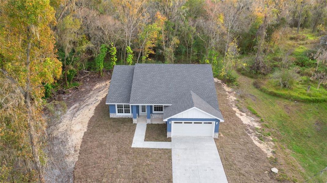 Front exterior of a new home in , Lakeland, FL, highlighting curb appeal (Image 19).