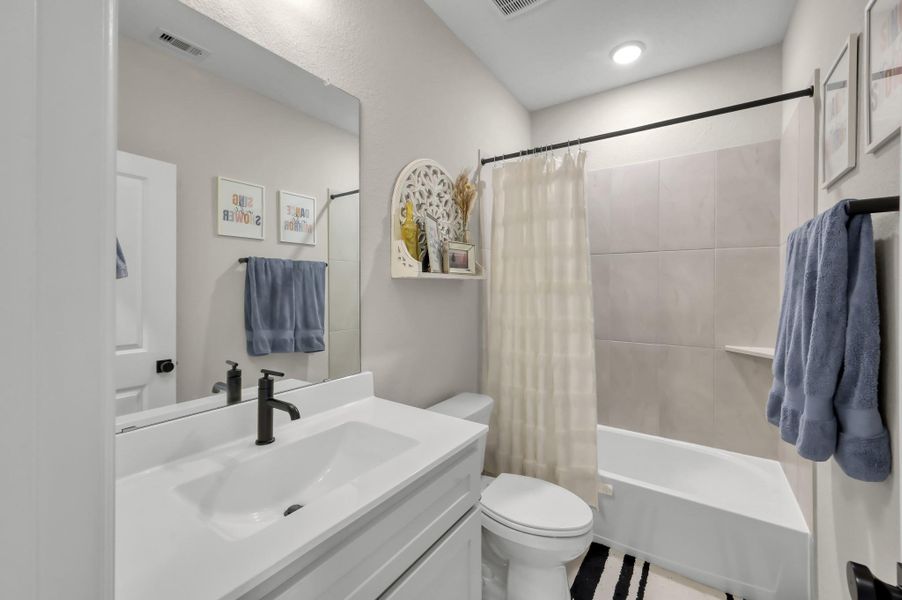 Furnished interior view inside a new home in The Woodlands Hills 60’, Willis (Image 6).