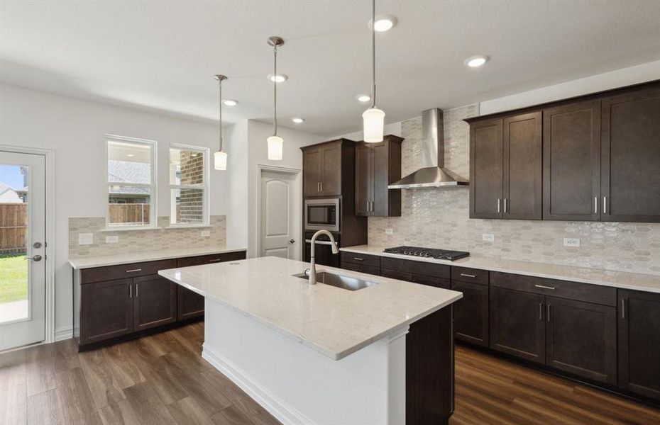 Bright kitchen with ample cabinet space *real home pictured