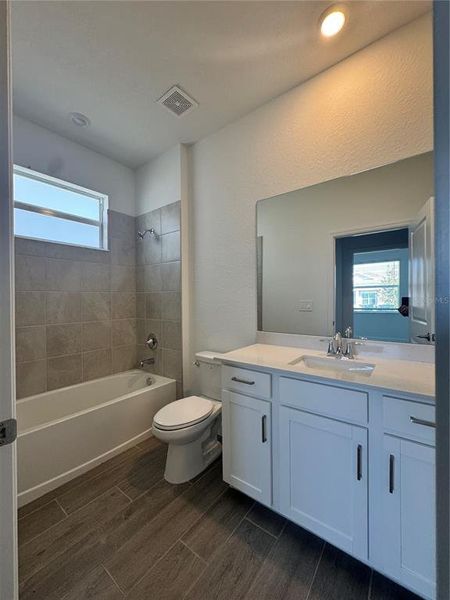 Furnished interior view inside a new home in Harbor East: Executive Homes, Port Charlotte (Image 8). Furnished interior view inside a new home in Harbor East: Executive Homes, Port Charlotte (Image 8).