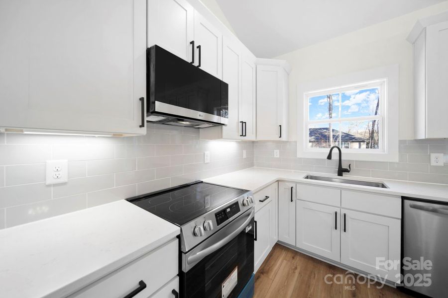 Furnished interior view inside a new home in , Oakboro (Image 11).
