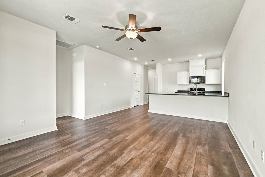 Spacious, unfurnished interior of a new home in The Cottages at Pagosa Springs, Bryan (Image 9).