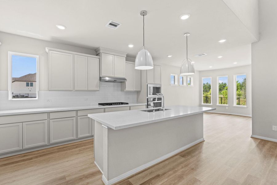 Furnished interior view inside a new home in Bridgeland, Cypress (Image 12).