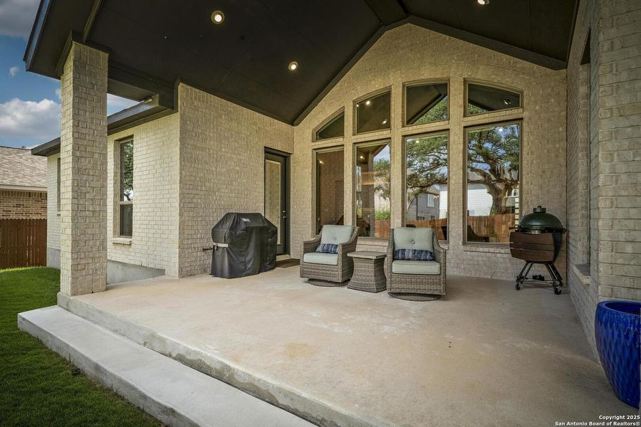 Exterior details and patio area of a home in Balcones Creek 70', Boerne (Image 24).