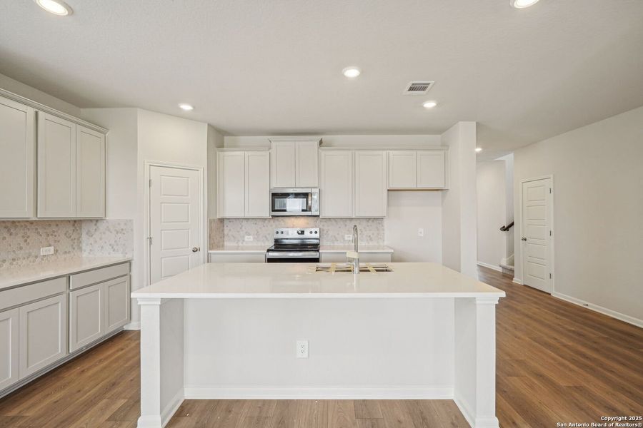 Furnished interior view inside a new home in Sagebrooke - Premier Series, San Antonio (Image 6). Furnished interior view inside a new home in Sagebrooke - Premier Series, San Antonio (Image 6).