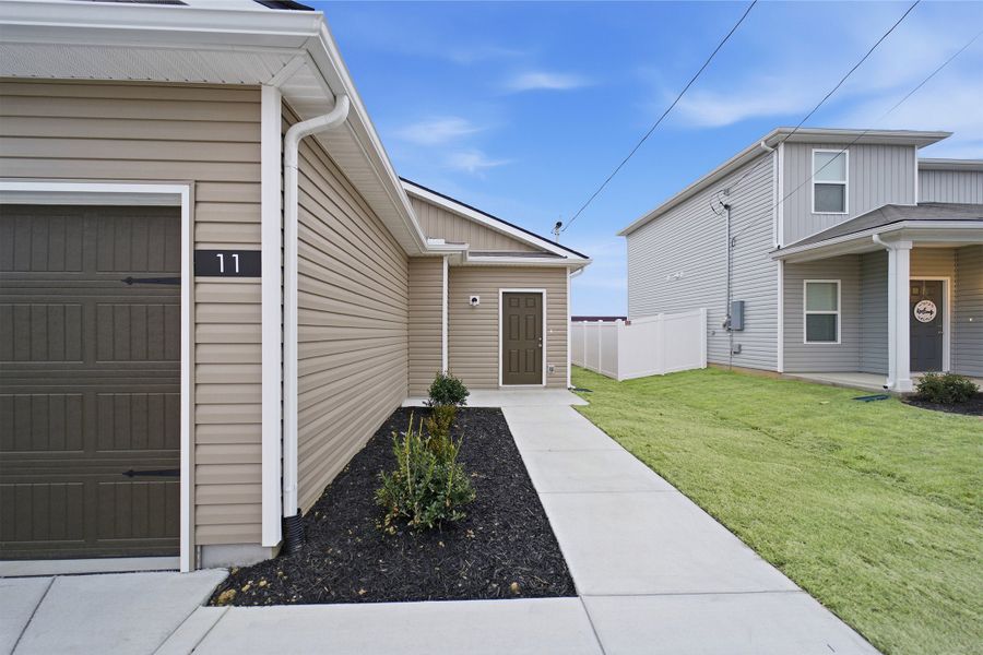 Exterior details and patio area of a home in Stonehenge, Manchester (Image 3). Exterior details and patio area of a home in Stonehenge, Manchester (Image 3).