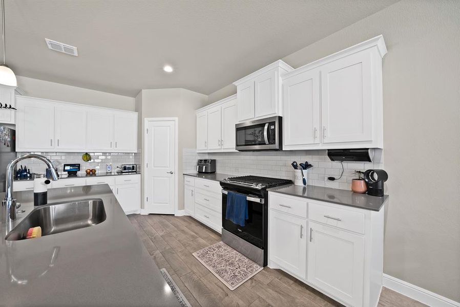 Furnished interior view inside a new home in Pecan Square, Northlake (Image 28).