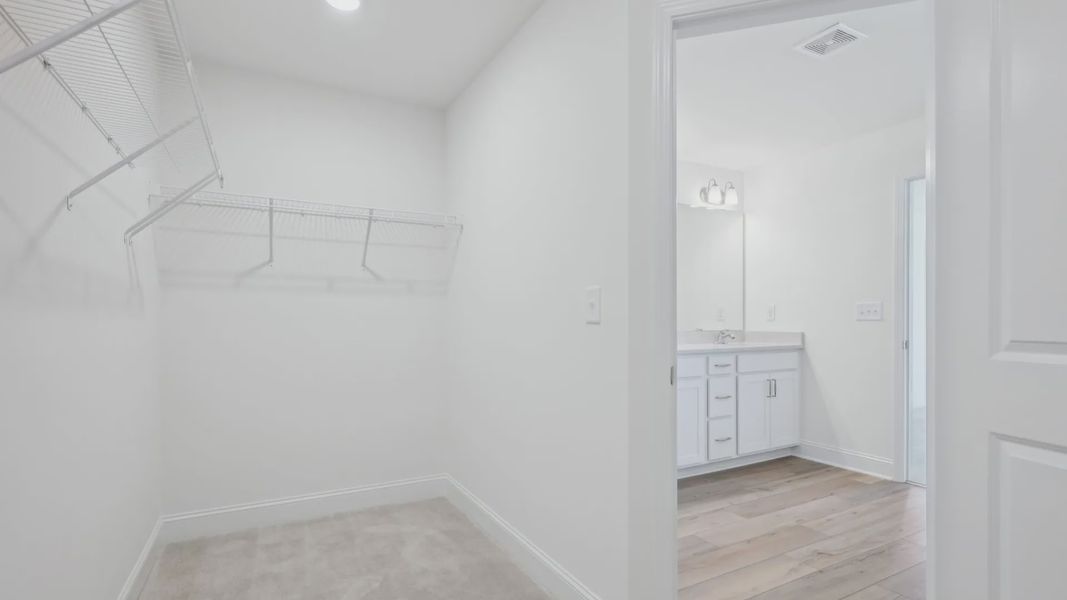 Furnished interior view inside a new home in Sidney Creek Single Family, Zebulon (Image 18).