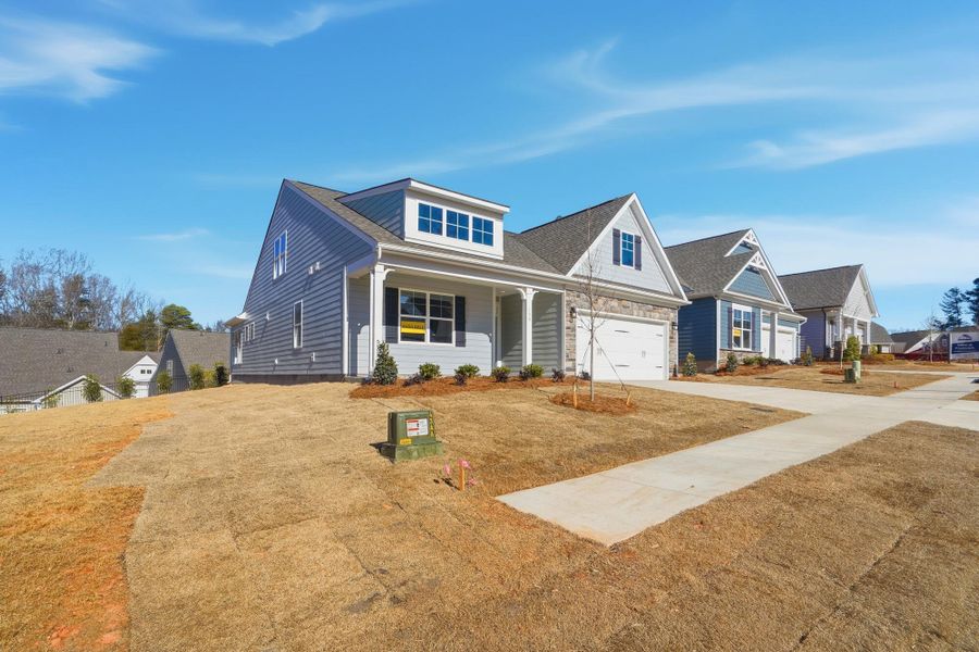 Front exterior of a new home in Villas at Prestwick, Mooresville, NC, highlighting curb appeal (Image 25).