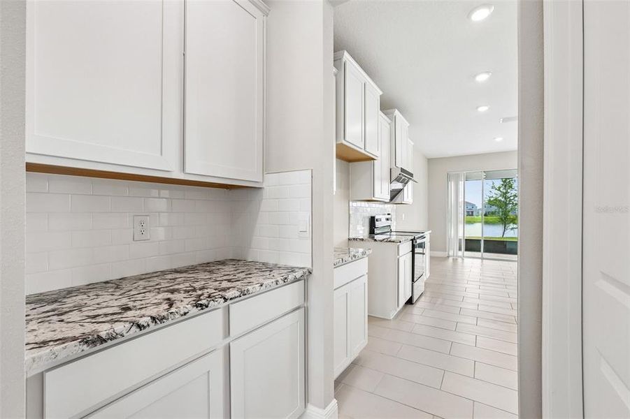 Furnished interior view inside a new home in Mangrove Manor, Apollo Beach (Image 6).