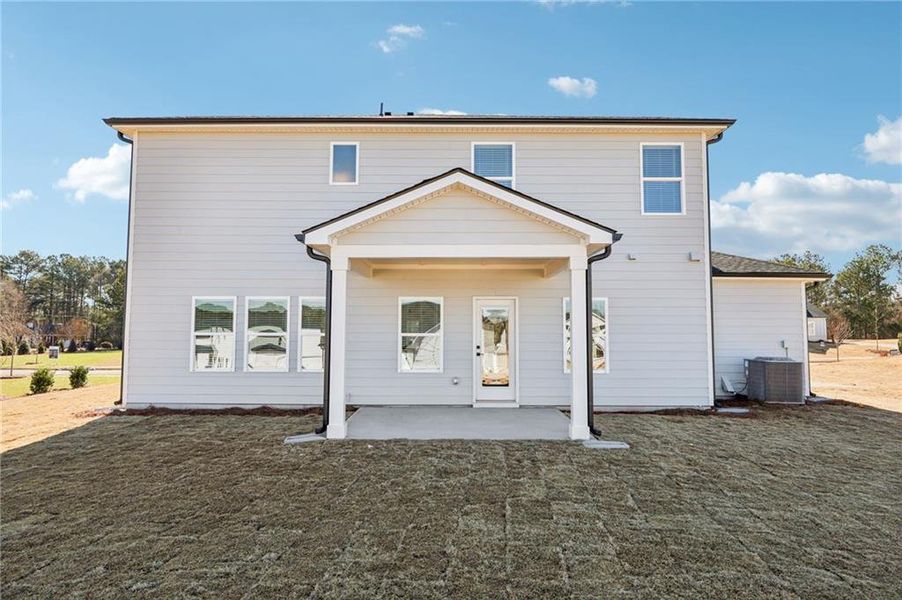 Exterior details and patio area of a home in River Pointe, Monroe (Image 4).