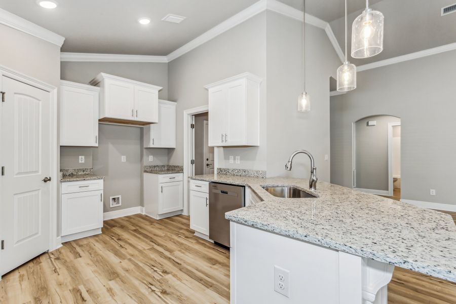 Representative furnished interior of a home built from the The Carlos by Herbst Homes in Doyle Hawkins Landing, Navarre (Image 64).