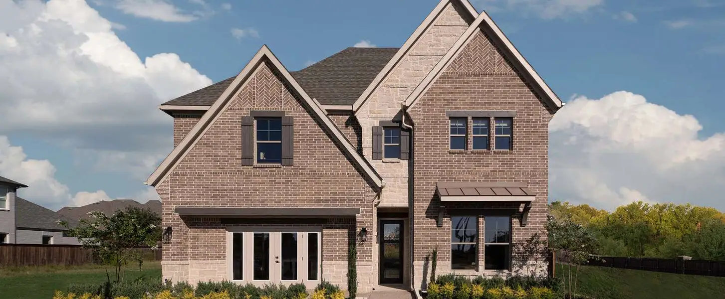 Representative exterior photo of a completed home built from the Avery by Ashton Woods in Furst Ranch, Argyle, TX (Image 2). Representative exterior photo of a completed home built from the Avery by Ashton Woods in Furst Ranch, Argyle, TX (Image 2).