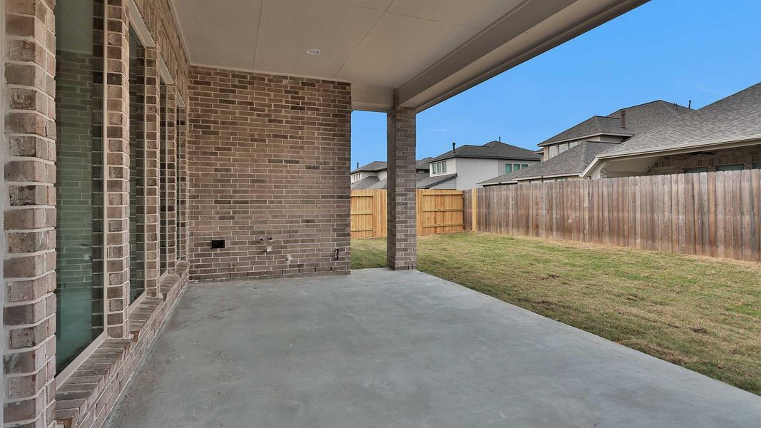 Exterior details and patio area of a home in StoneCreek Estates, Richmond (Image 3).