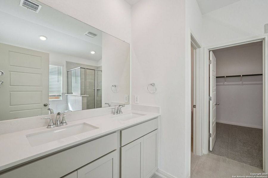 Furnished interior view inside a new home in Estancia Ranch - Premier Series, San Antonio (Image 12). Furnished interior view inside a new home in Estancia Ranch - Premier Series, San Antonio (Image 12).