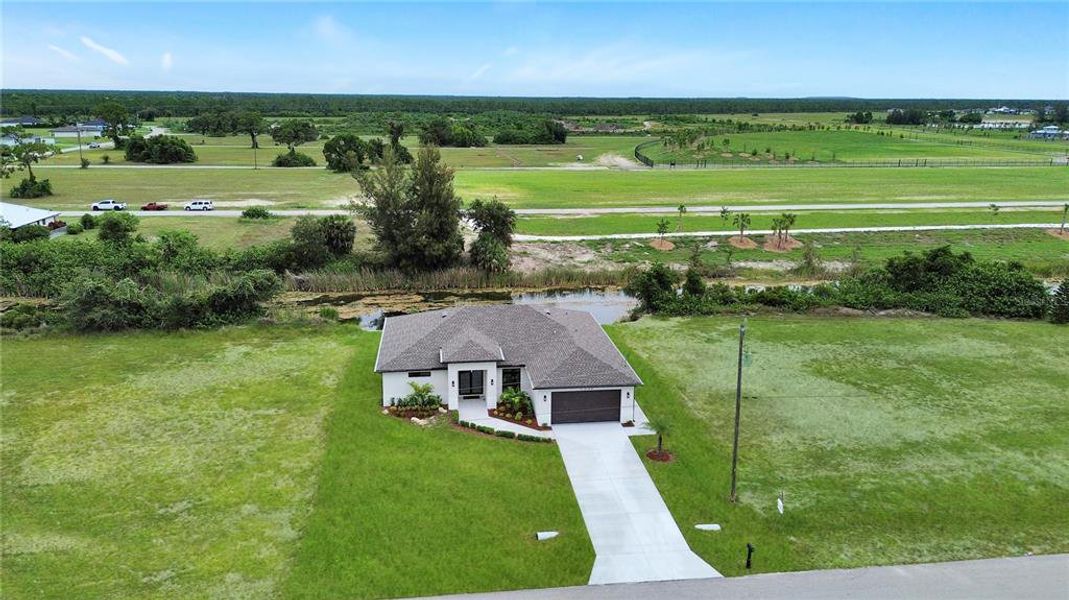 Front exterior of a new home in , Cape Coral, FL, highlighting curb appeal (Image 29).