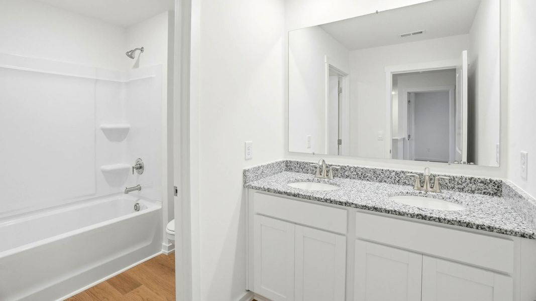 Representative furnished interior of a home built from the Manning by D.R. Horton in Highland View, Seymour (Image 7).