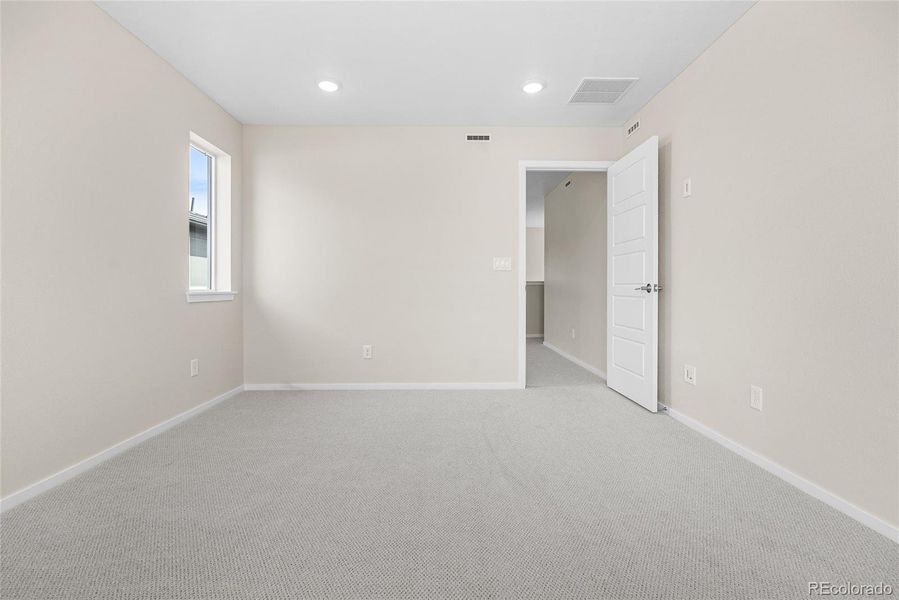 Spacious, unfurnished interior of a new home in Barefoot Village, Firestone (Image 15).