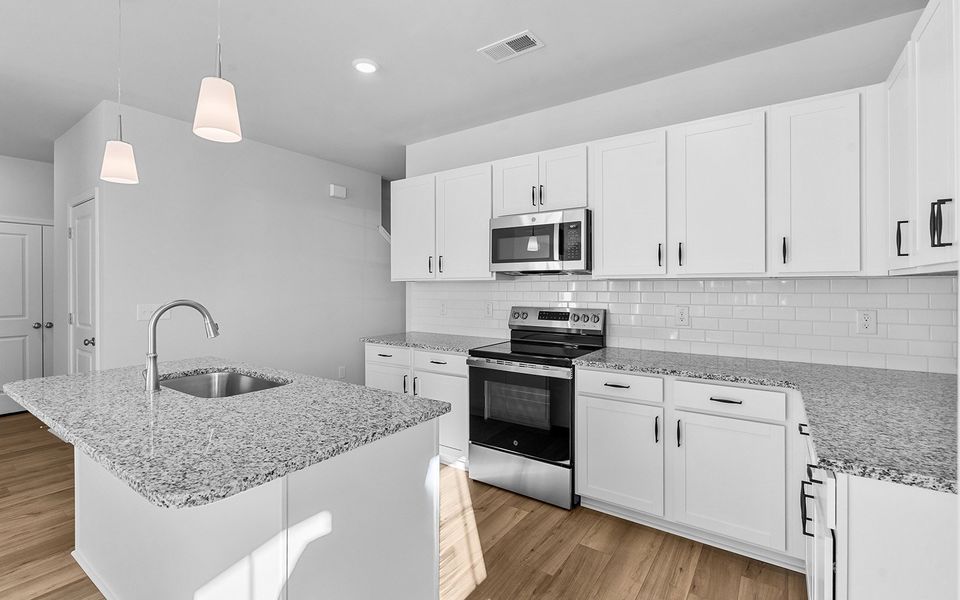 Furnished interior view inside a new home in Fieldstone, Lexington (Image 7). Furnished interior view inside a new home in Fieldstone, Lexington (Image 7).