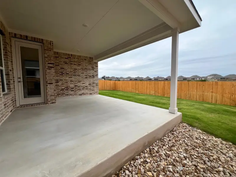 Exterior details and patio area of a home in Rosenbusch Ranch, Leander (Image 2).