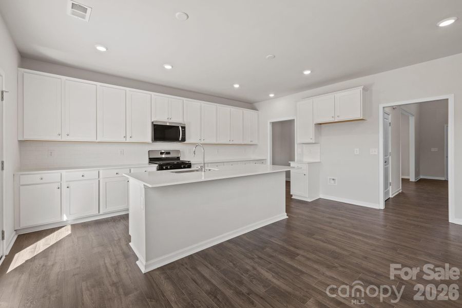 Furnished interior view inside a new home in McFarland Estates, York (Image 5).