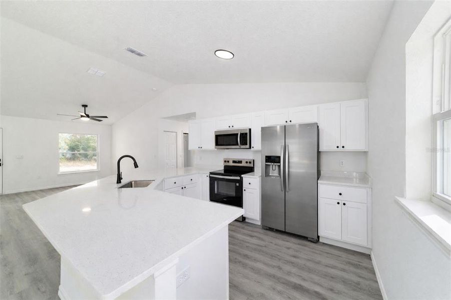 Furnished interior view inside a new home in , Dunnellon (Image 3).