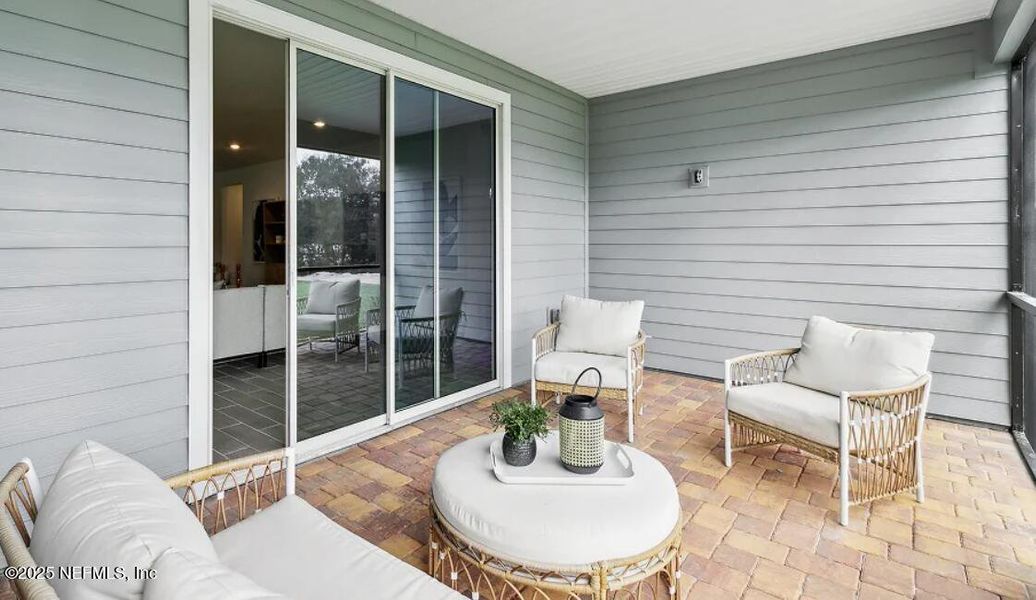 Exterior details and patio area of a home in Edenbrooke at Hyland Trail | 55+: Edenbrooke at Hyland Trail 60s, Green Cove Springs (Image 1).