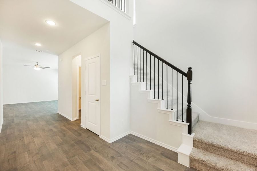 Representative exterior photo of a completed home built from the Lockhart by Impression Homes in Heartland, Heartland, TX (Image 17).