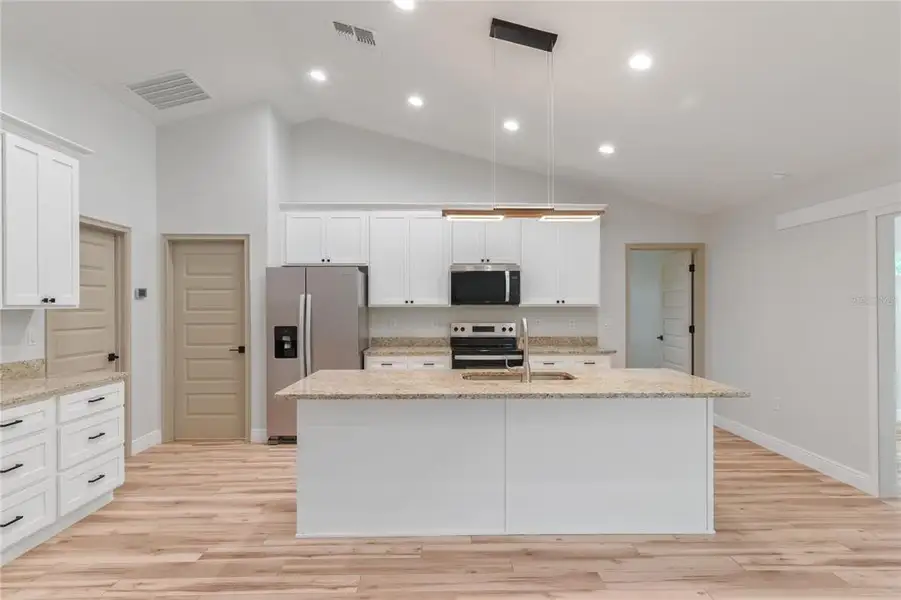 Furnished interior view inside a new home in , Ocala (Image 8).