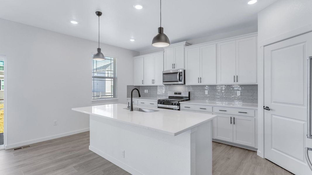 Representative furnished interior of a home built from the Calhan by D.R. Horton in Vantage, Berthoud (Image 6).