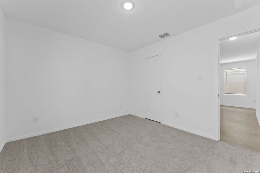Spacious, unfurnished interior of a new home in Higdon Crossing, San Antonio (Image 12).