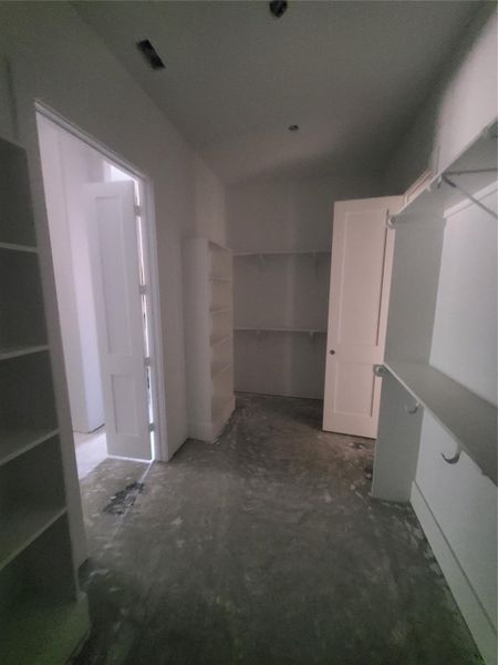 BACK ANGLE OF THE PRIMARY CLOSET