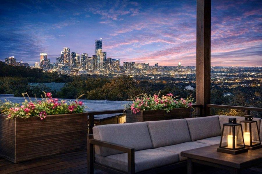 Balcony with a view of skyline and an outdoor living space