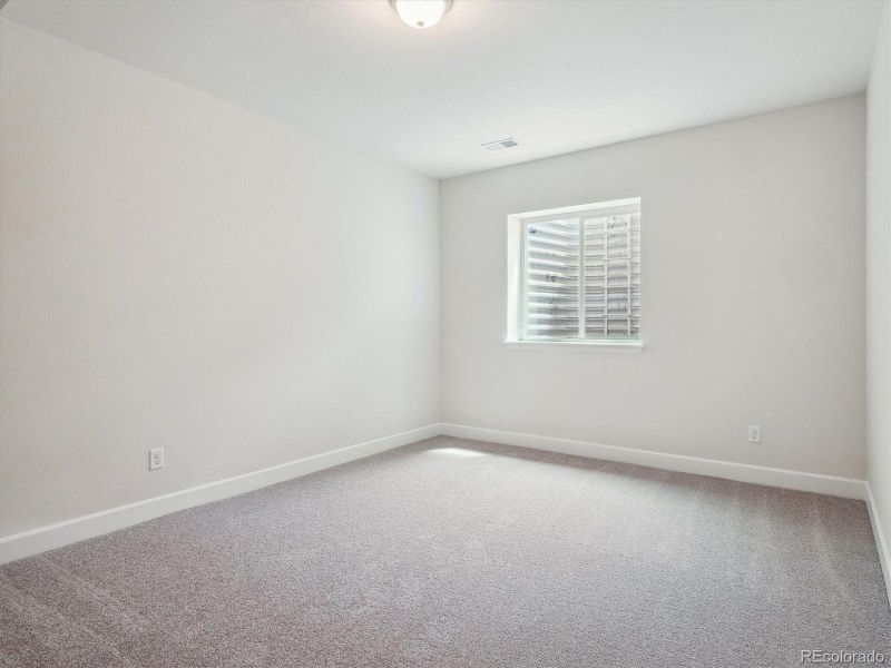 Spacious, unfurnished interior of a new home in Vista Pines at Crystal Valley, Castle Rock (Image 34).
