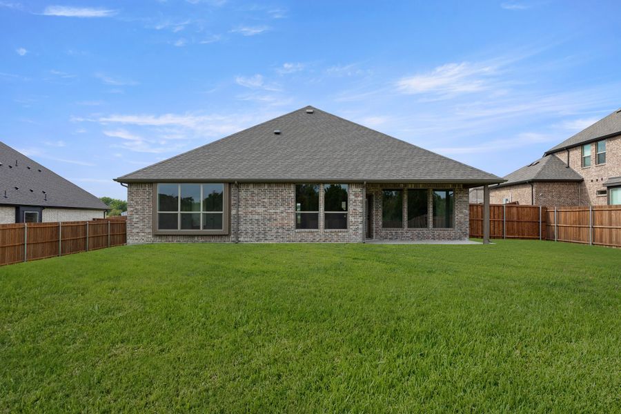 Exterior details and patio area of a home in Lovers Landing, Forney (Image 4).