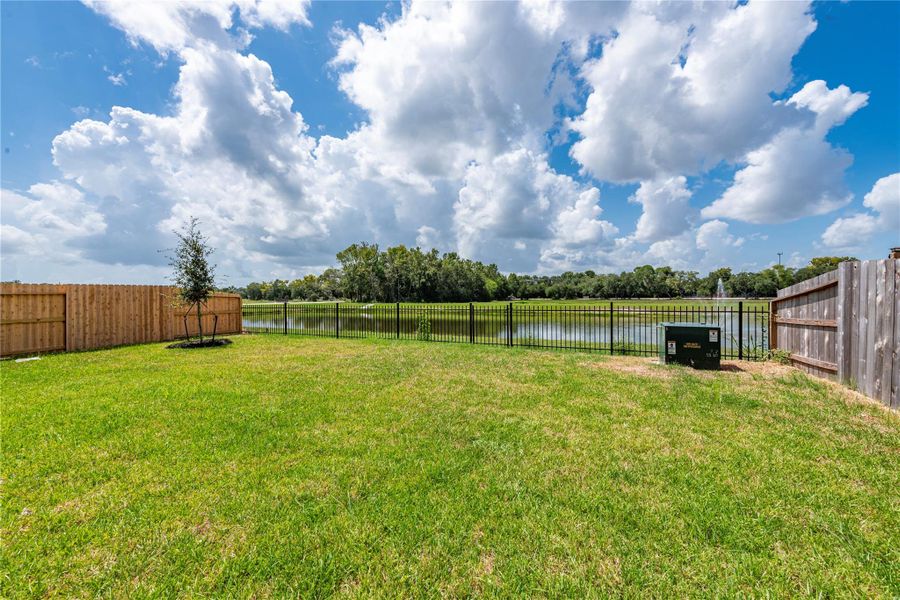 Front exterior of a new home in , Santa Fe, TX, highlighting curb appeal (Image 24).