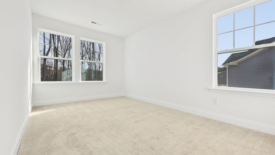 Furnished interior view inside a new home in Battle Bridge, Raleigh (Image 13).