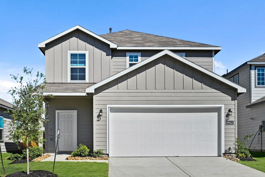 Front exterior of a new home in Northpark South, Porter, TX, highlighting curb appeal (Image 2). Front exterior of a new home in Northpark South, Porter, TX, highlighting curb appeal (Image 2).