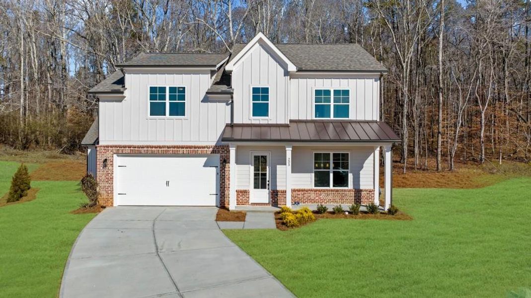 Front exterior of a new home in , Canton, GA, highlighting curb appeal (Image 27).