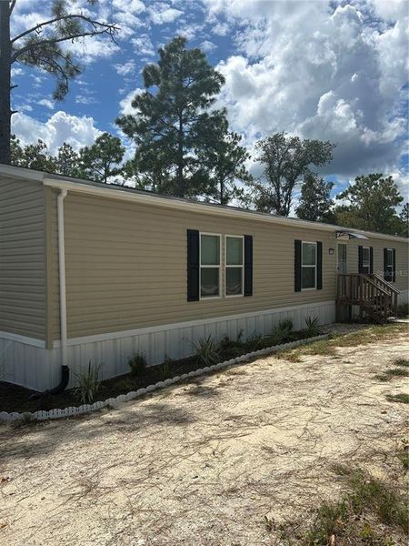 Exterior details and patio area of a home in , Morriston (Image 1). Exterior details and patio area of a home in , Morriston (Image 1).