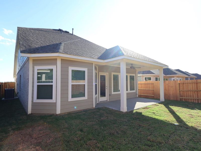 Exterior details and patio area of a home in Sorella, Tomball (Image 14).