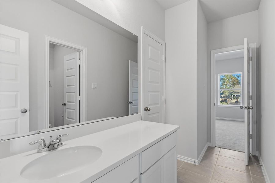 Furnished interior view inside a new home in The Woodlands Hills, Willis (Image 11).