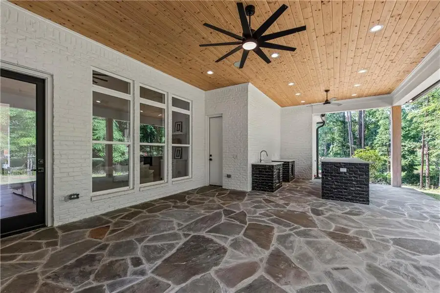 Exterior details and patio area of a home in , Greensboro (Image 29).