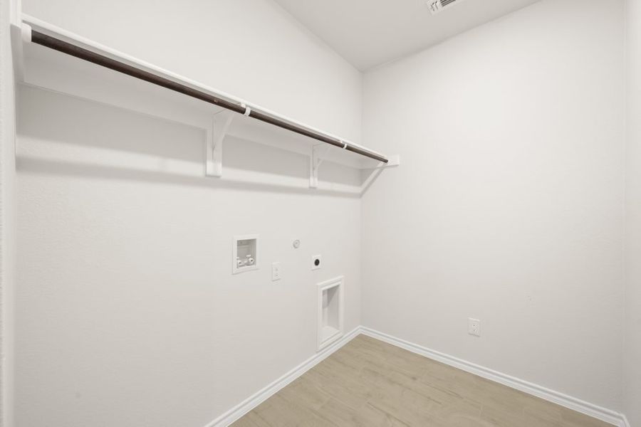 Front exterior of a new home in Myrtle Creek, Waxahachie, TX, highlighting curb appeal (Image 27). Front exterior of a new home in Myrtle Creek, Waxahachie, TX, highlighting curb appeal (Image 27).