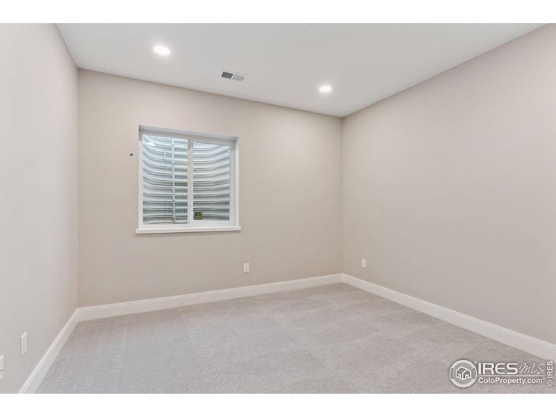 Spacious, unfurnished interior of a new home in Harvest LiteLuxe, Berthoud (Image 19).