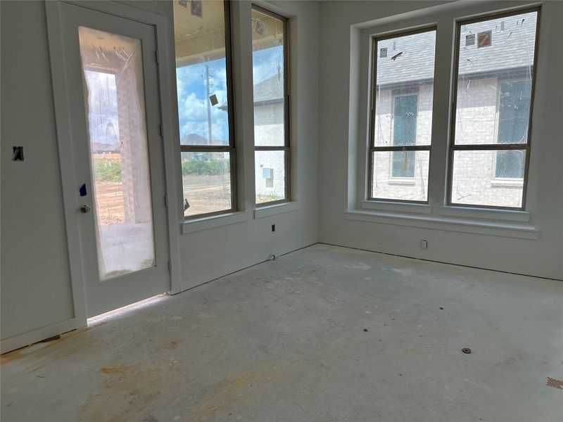 Dining area complete with window bench. Dining area complete with window bench.