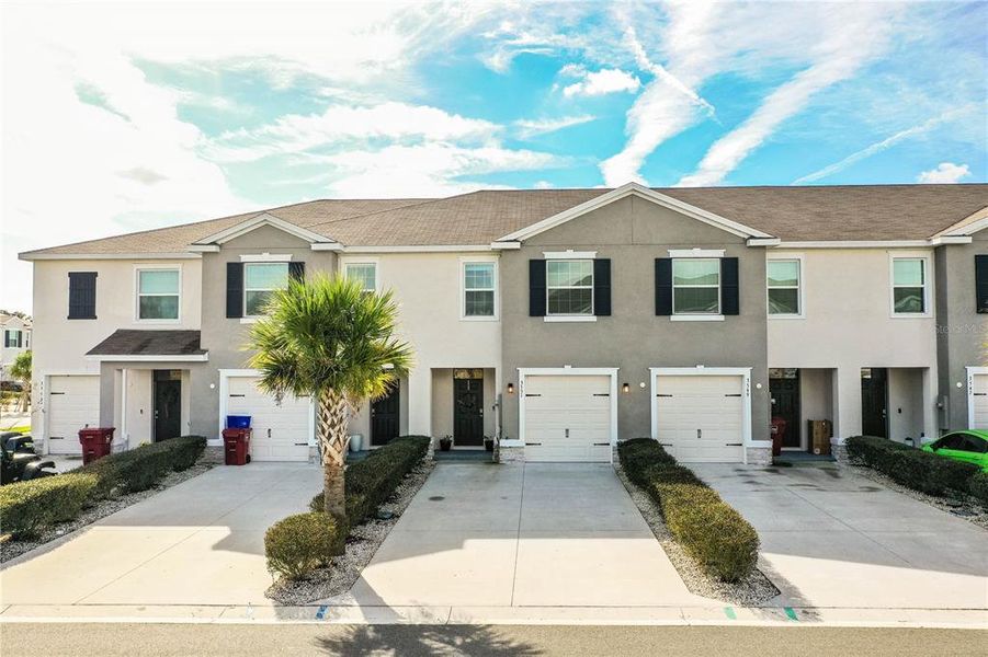 Front exterior of a new home in , Plant City, FL, highlighting curb appeal (Image 27).