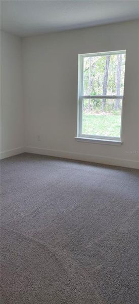 Spacious, unfurnished interior of a new home in Royal Highlands, Weeki Wachee (Image 13).
