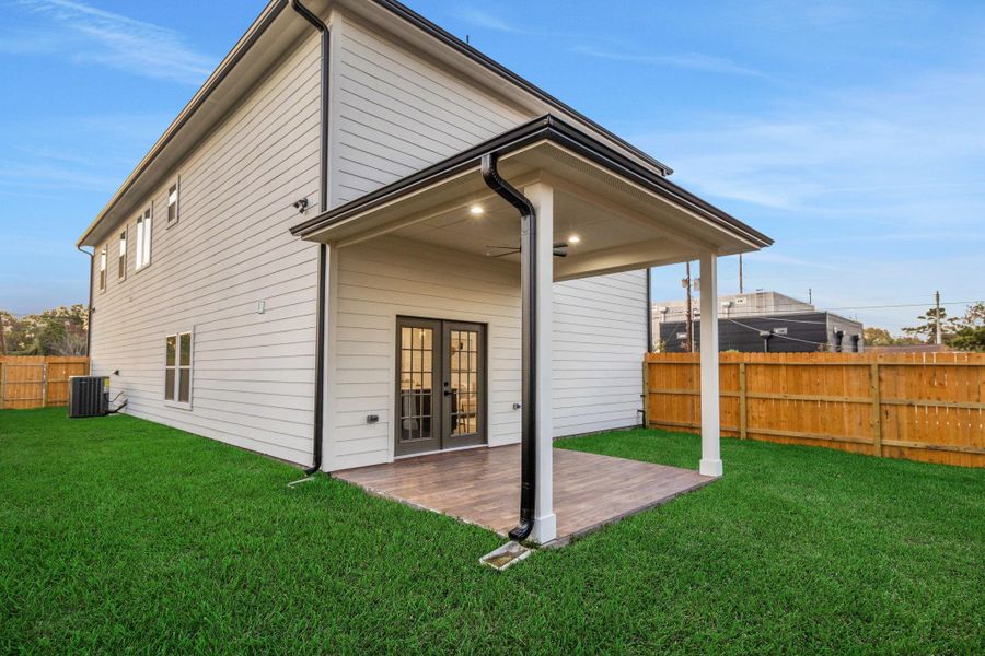 Enjoy year-round comfort on the covered patio complete with ceiling fan and tile flooring. Enjoy year-round comfort on the covered patio complete with ceiling fan and tile flooring.